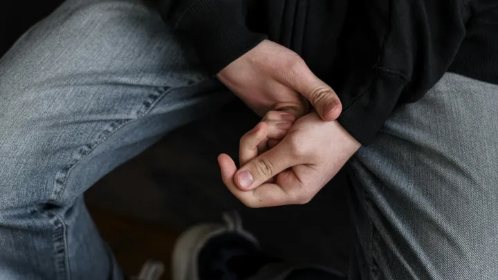 A youth's hands