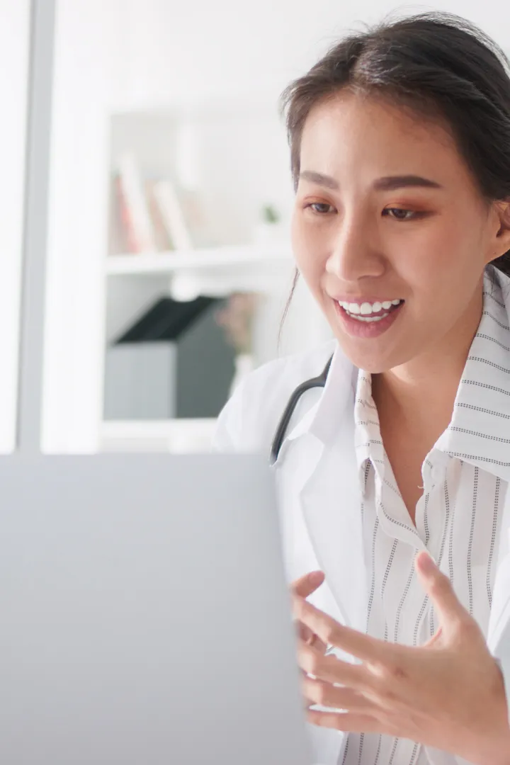 A doctor reviewing results