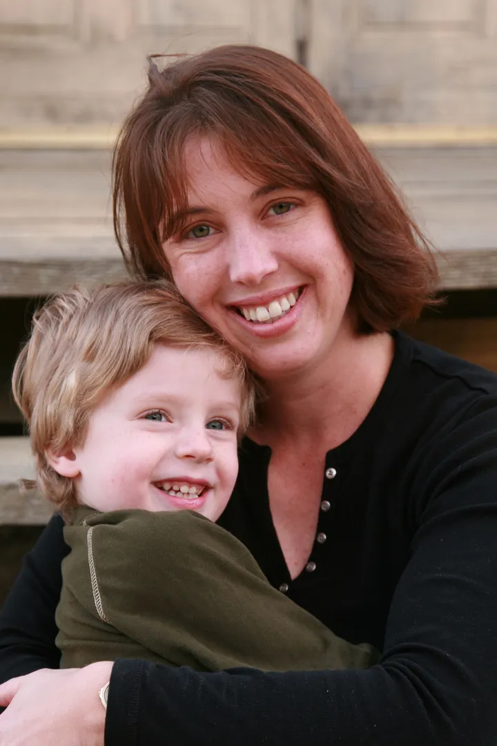 Mother hugging child