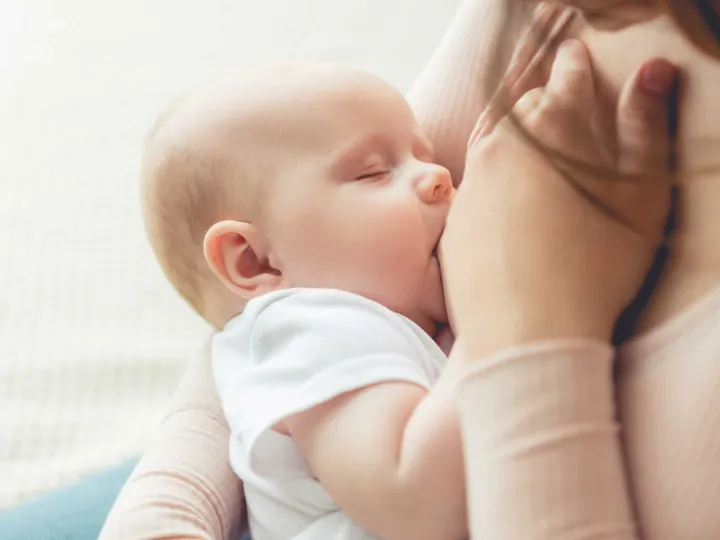 A breast feeding baby