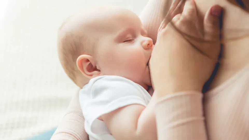 A breast feeding baby